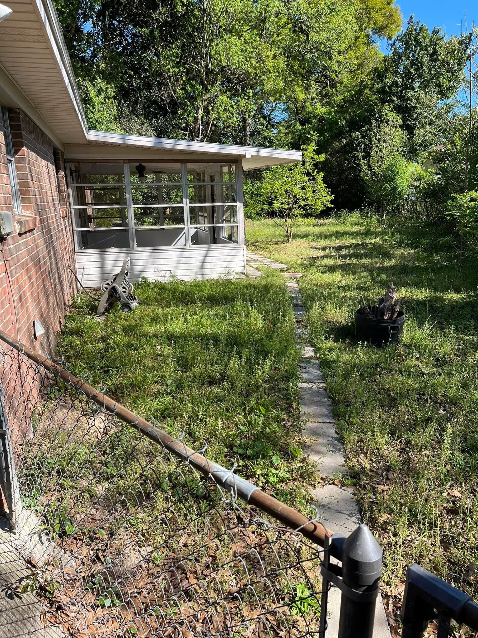 Before lawn care service by Stokes Lawn Care